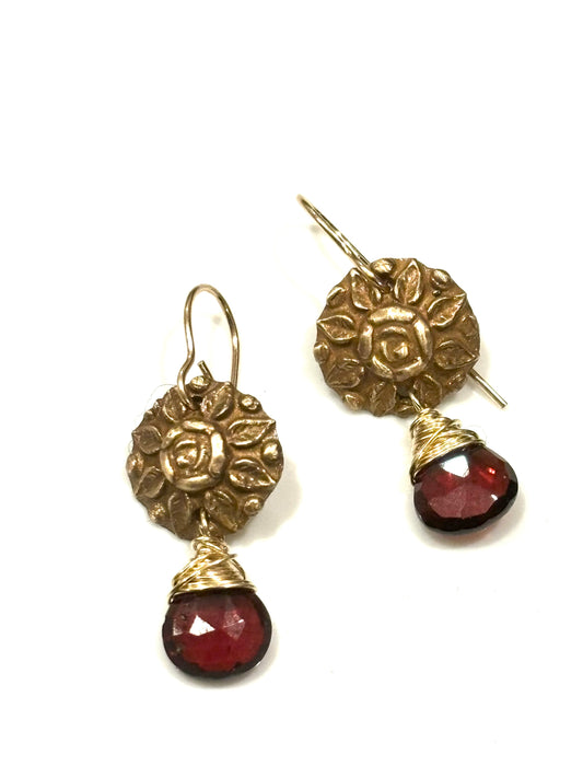 Garnets with bronze button medallion