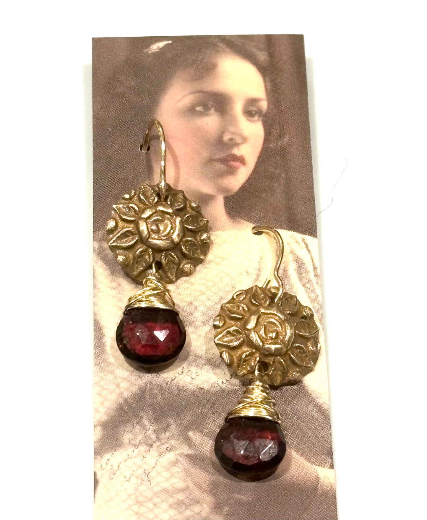 Garnets with bronze button medallion