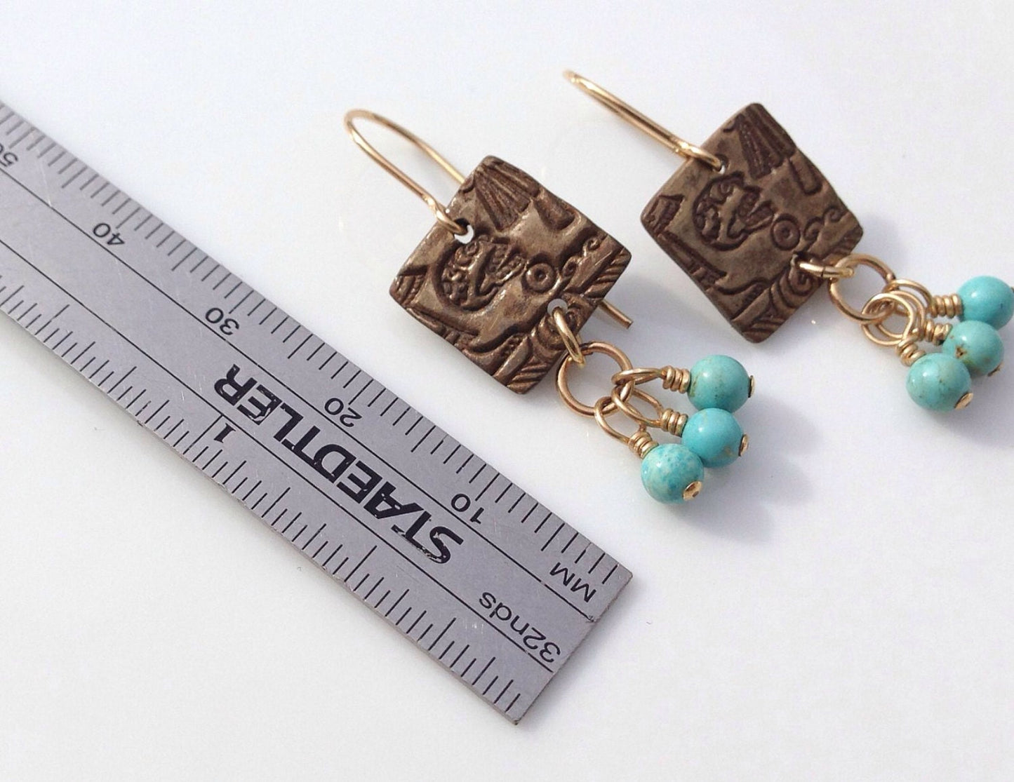 Calavera square earrings with turquoise dangles